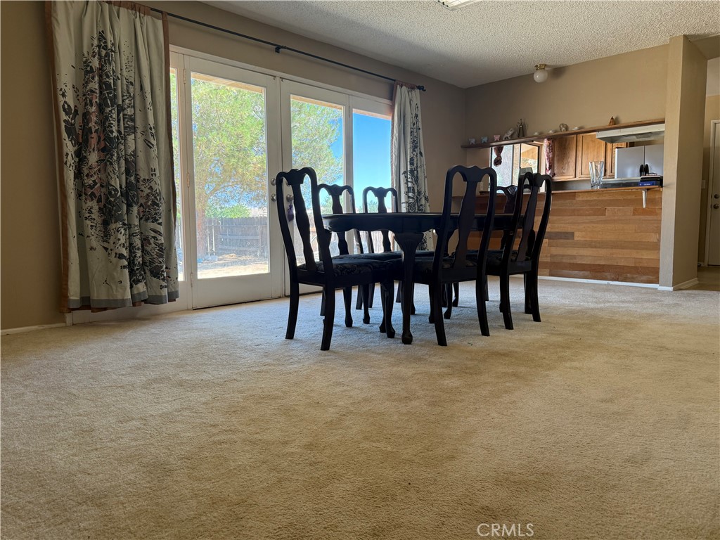 243 Balboa Avenue Mojave, CA 93501 - Photo 5 of 75 a view of a dining room with furniture and window