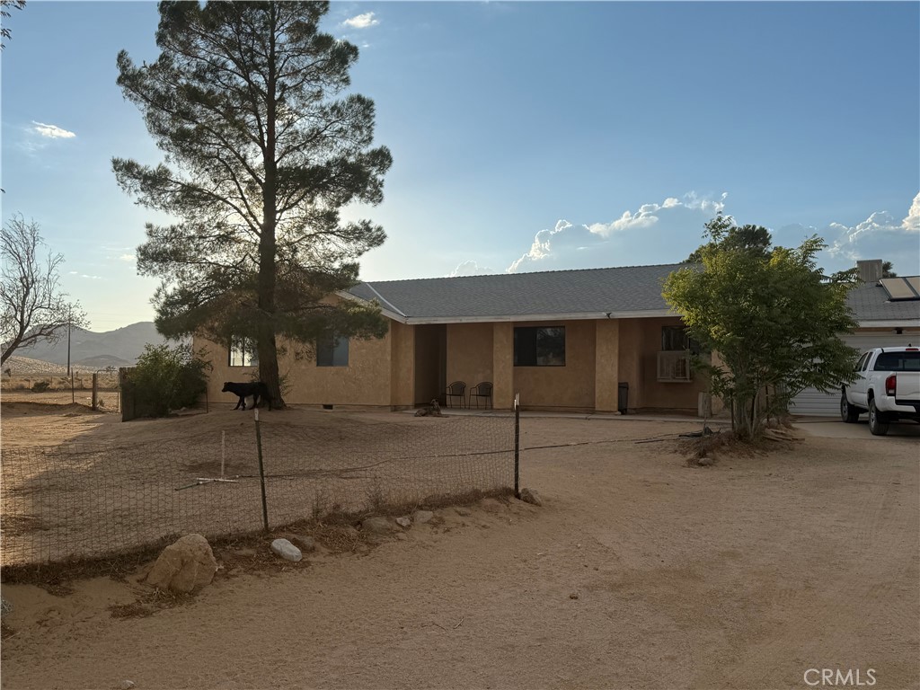 243 Balboa Avenue Mojave, CA 93501 - Photo 70 of 75 a view of a house with a patio