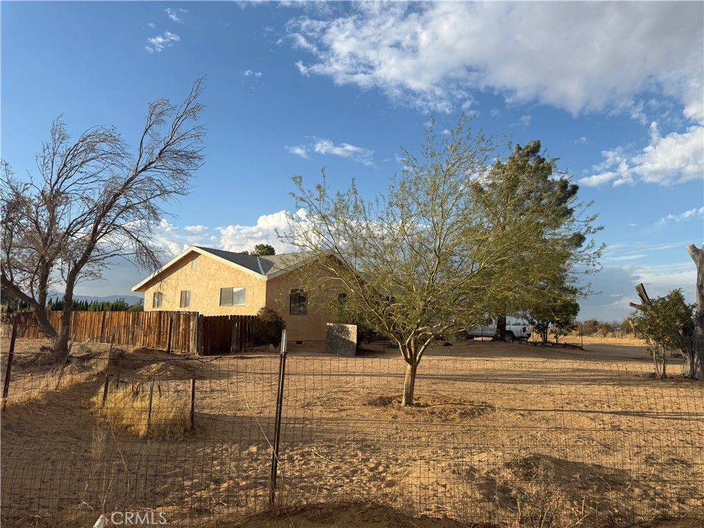 243 Balboa Avenue Mojave, CA 93501 - Photo 73 of 75 a front view of a house with a yard