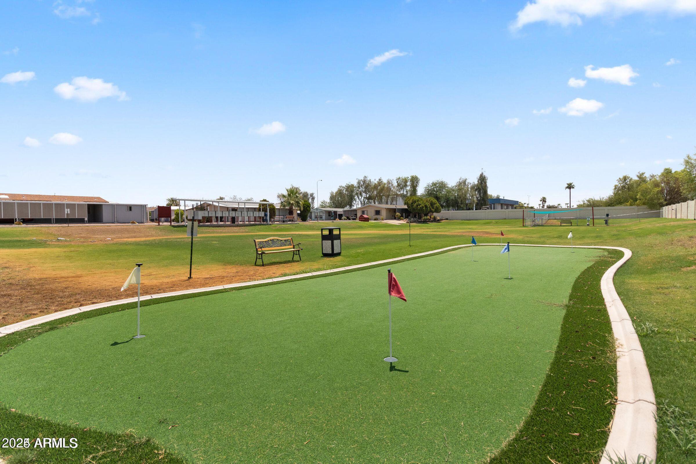 3330 East Main Street, Unit 9 Mesa, AZ 85213 - Photo 20 of 21 a view of a golf course with a lake view
