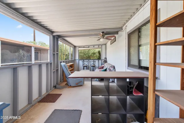 a kitchen with a white stove top oven sink and white refrigerator