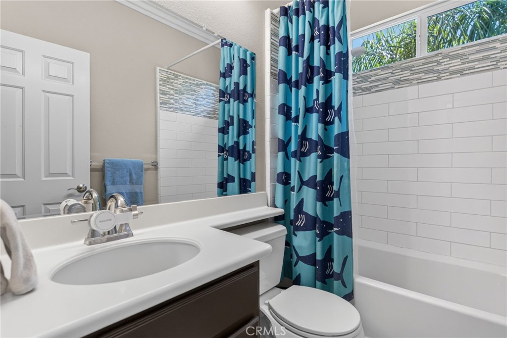 1268 Las Ventanas Way Riverside, CA 92508 - Photo 36 of 65 a bathroom with a sink toilet and shower