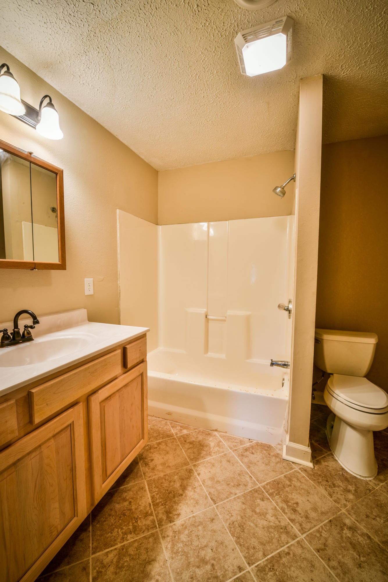 3984 Bent Road Kodak, TN 37764 - Photo 17 of 21 a bathroom with a sink a toilet and shower