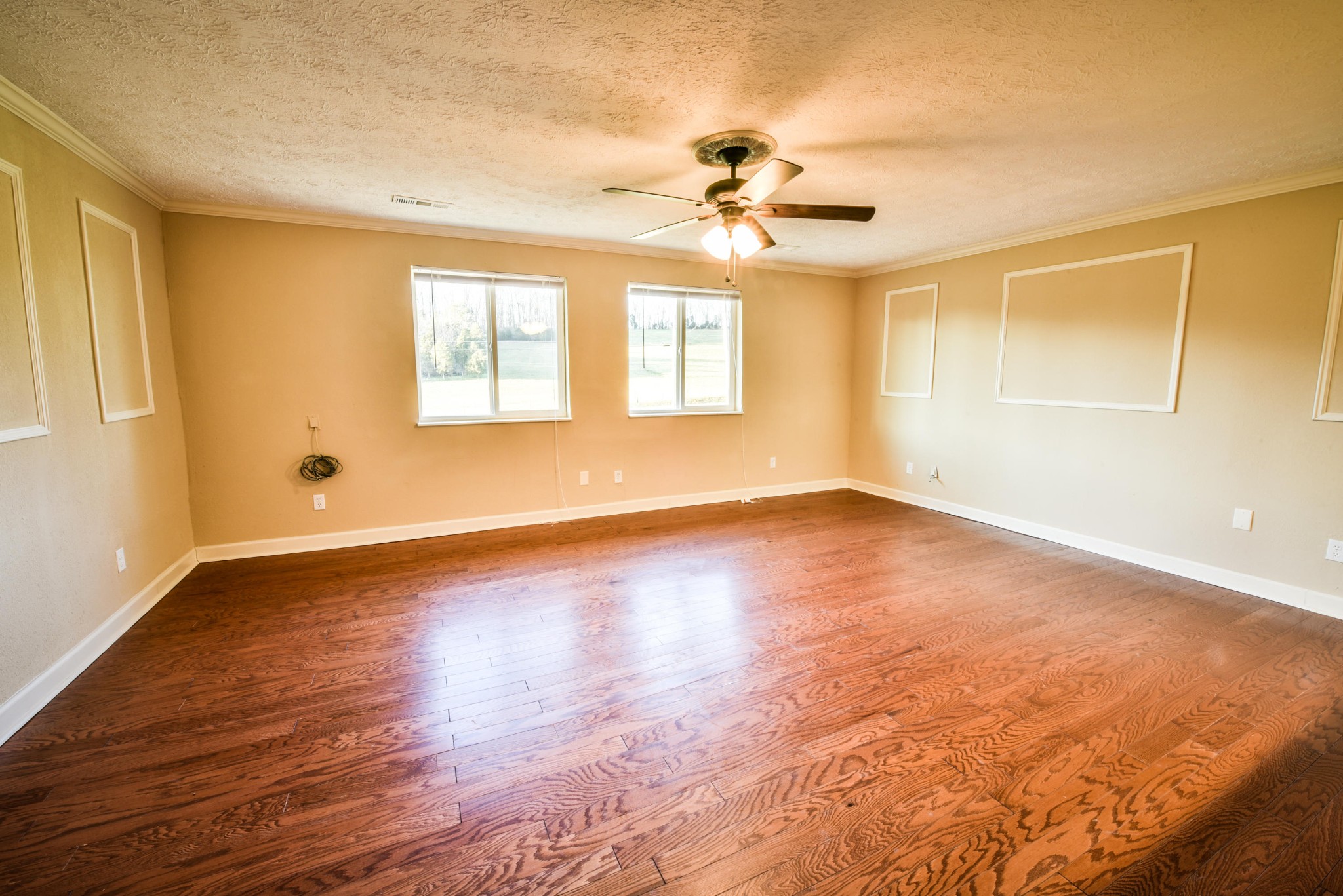 3984 Bent Road Kodak, TN 37764 - Photo 6 of 21 a view of an empty room with wooden floor and a window