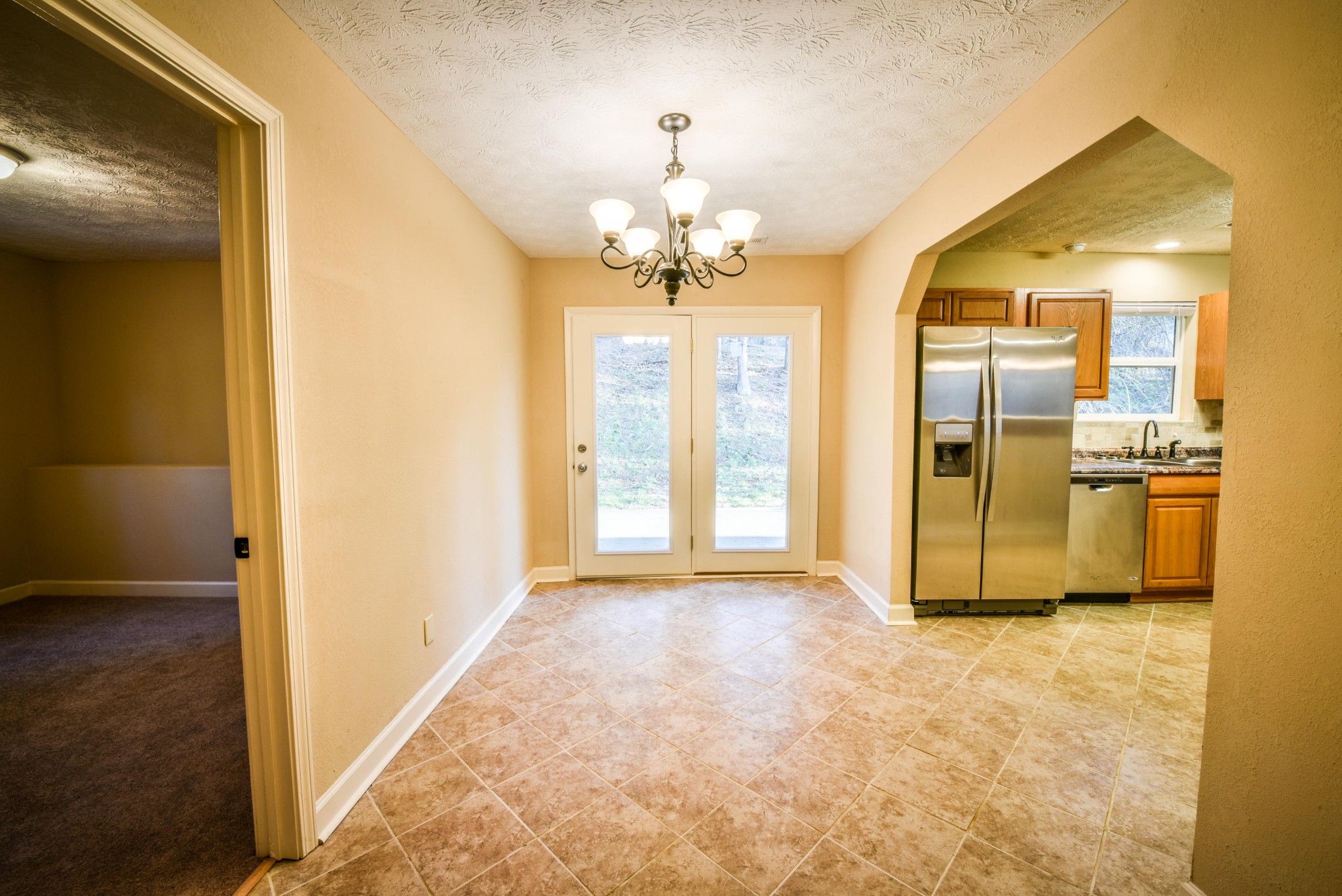 3984 Bent Road Kodak, TN 37764 - Photo 10 of 21 a view of a hallway with a chandelier