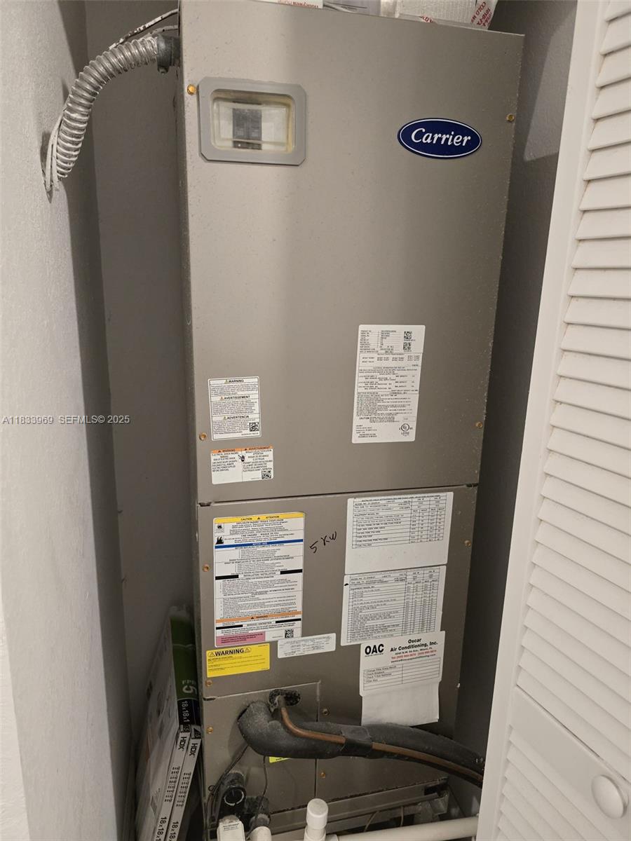 18264 Southwest 148th Road, Unit 18264 Miami, FL 33187 - Photo 14 of 25 a room with furniture and a window