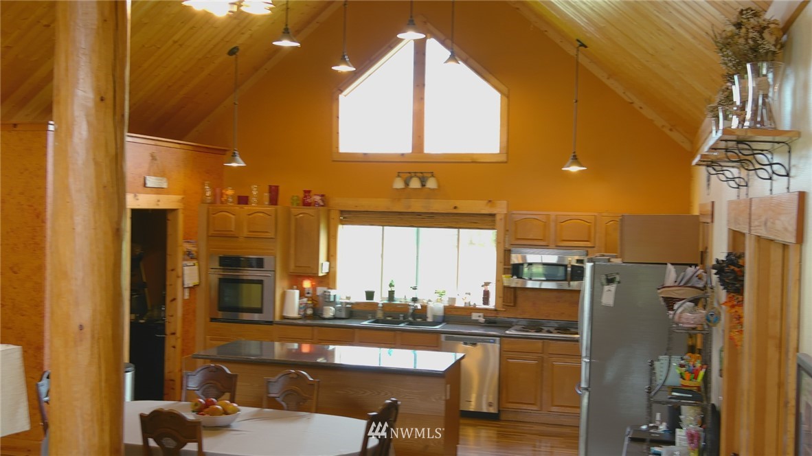 9302 Gastaeson Lane Southwest Rochester, WA 98579 - Photo 6 of 12 a view of a kitchen with a window