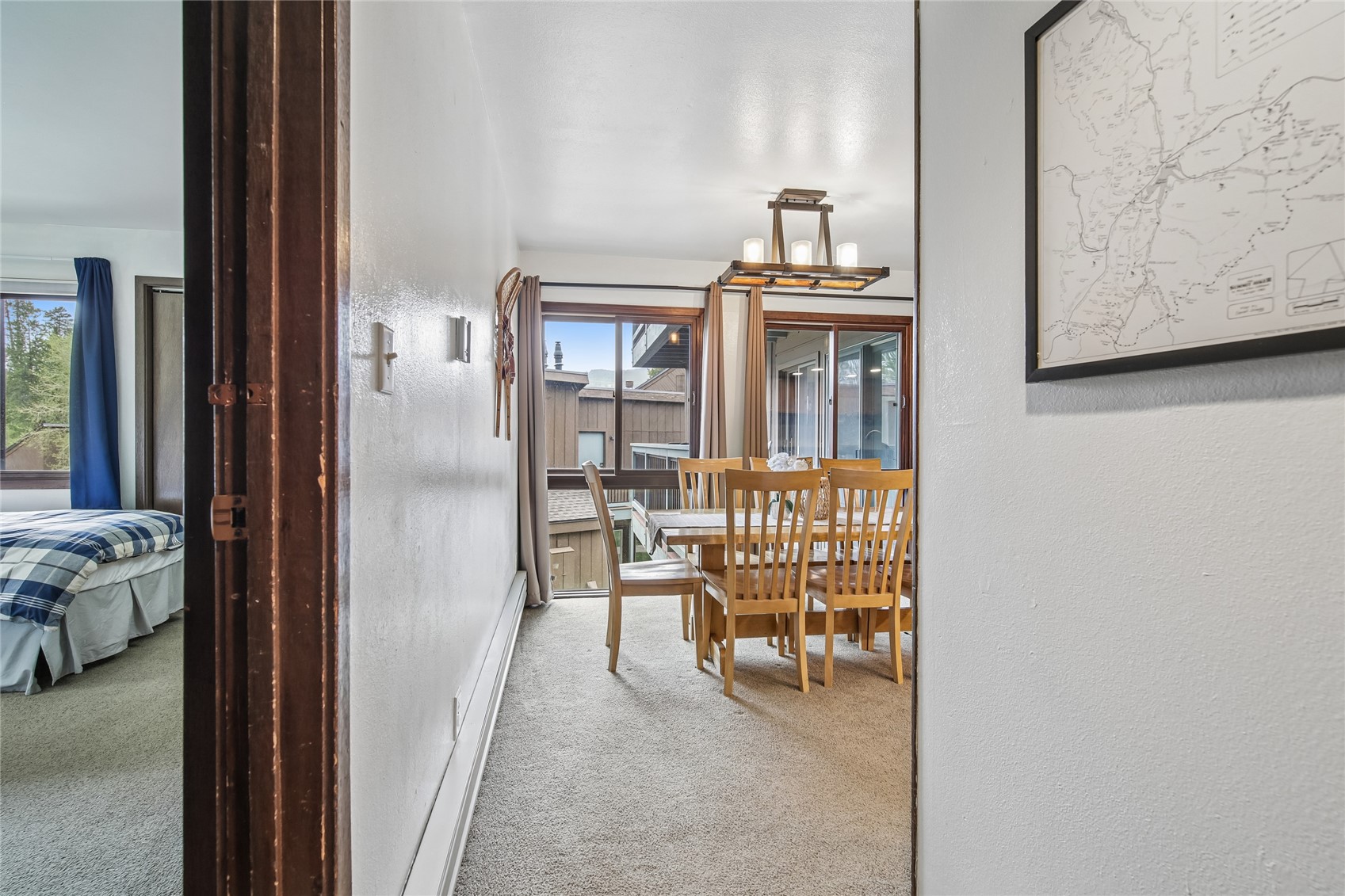 423 Wild Irishman Road, Unit 1008 1009 Keystone, CO 80435 - Photo 20 of 28 a view of a hallway to a livingroom with furniture