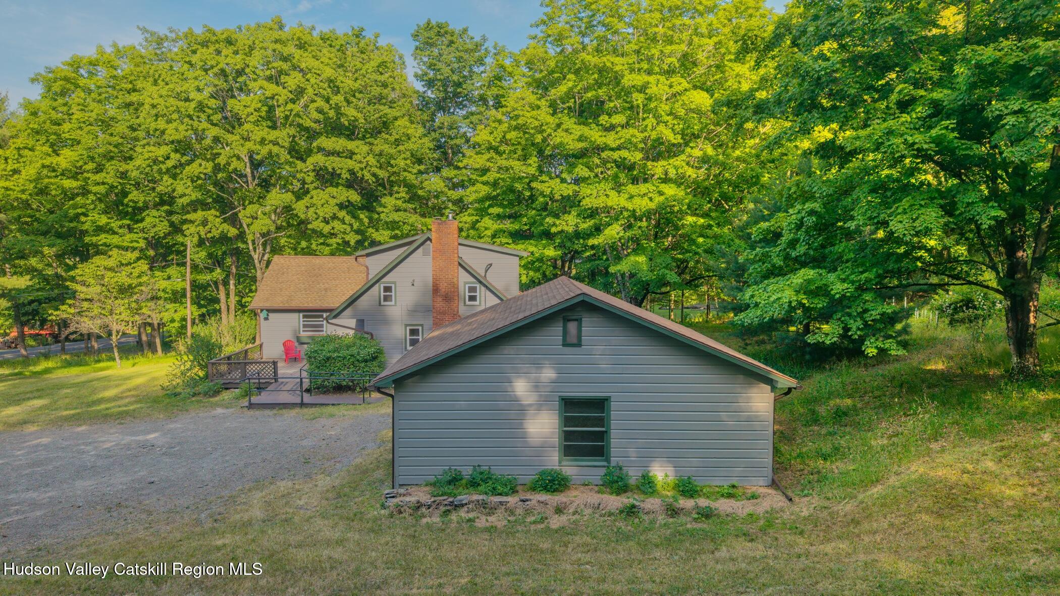 4533 Atwood Road Stone Ridge, NY 12484 - Photo 49 of 63 a view of a house with a yard