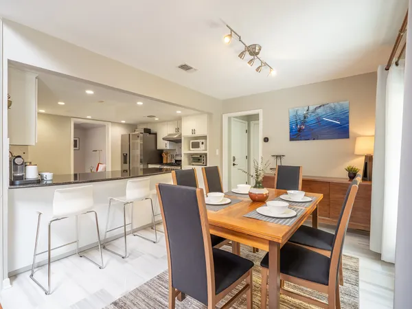 a view of a dining room with furniture