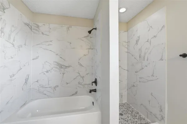 a bathroom with a bathtub