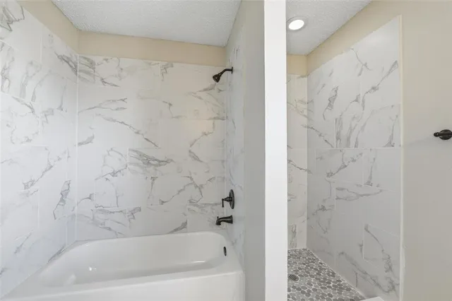 a bathroom with a bathtub