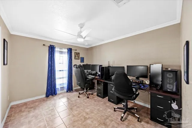 a view of a workspace with furniture