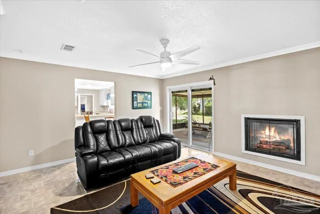 a living room with furniture and a table