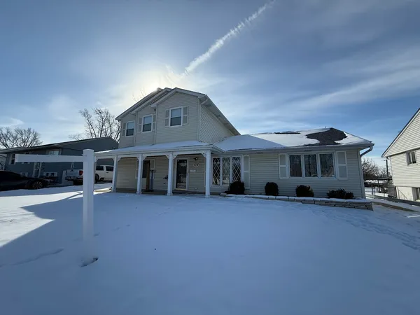 a view of a house with a big yard