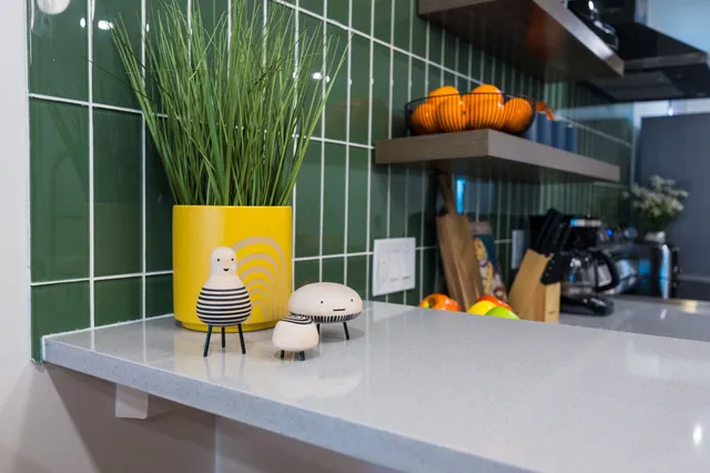 a view of a room with gym equipment and garden