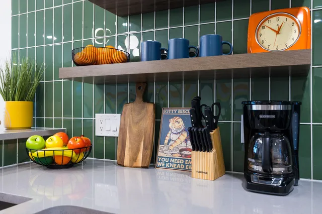 a outdoor view with a seating space and potted plants