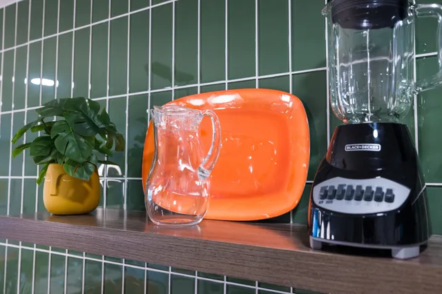 a vase of flowers sitting on a table
