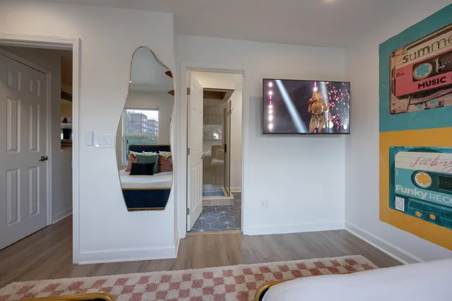 a view of a bathroom from a hallway