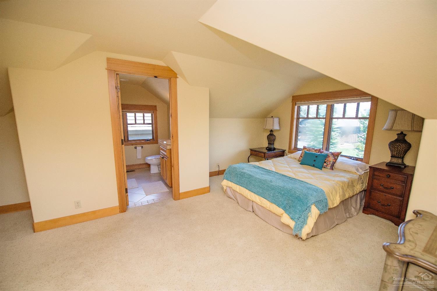 61831 Fall Creek Loop Bend, OR 97702 - Photo 16 of 23 Upstairs bedroom with attached full bath