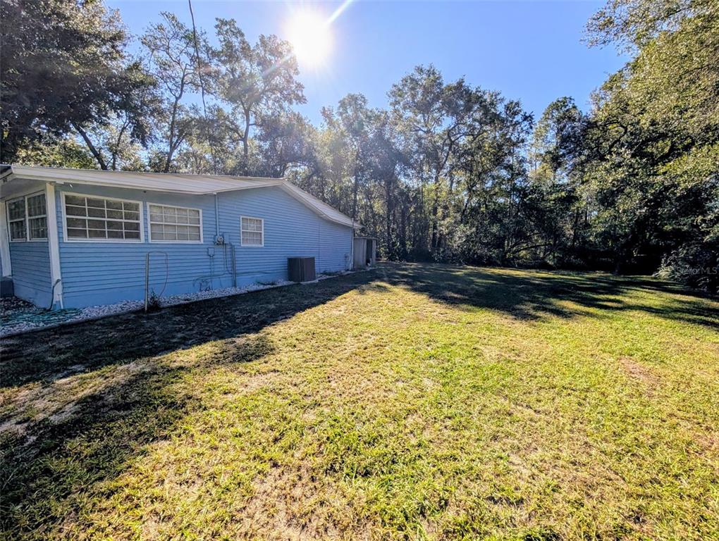 20422 Canvas Back Road Altoona, FL 32702 - Photo 22 of 24 a view of a house with a yard