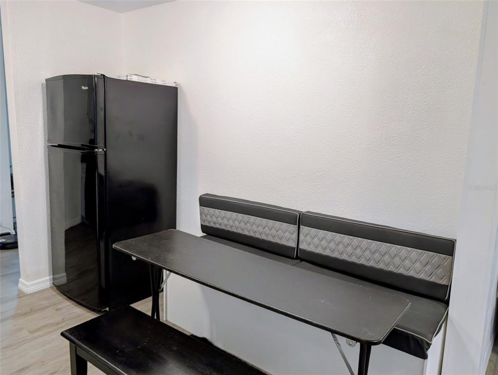 20422 Canvas Back Road Altoona, FL 32702 - Photo 10 of 24 a kitchen with a refrigerator and a stove