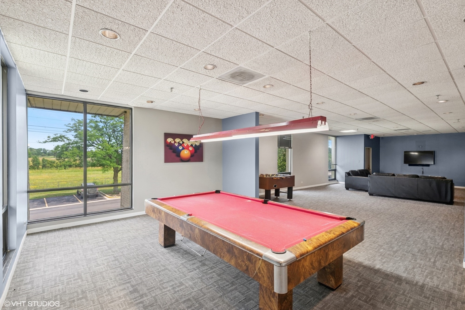 9701 North Dee Road, Unit 2I Niles, IL 60714 - Photo 17 of 24 a room with pool table flat screen tv