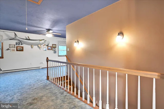 a view of hallway with stairs