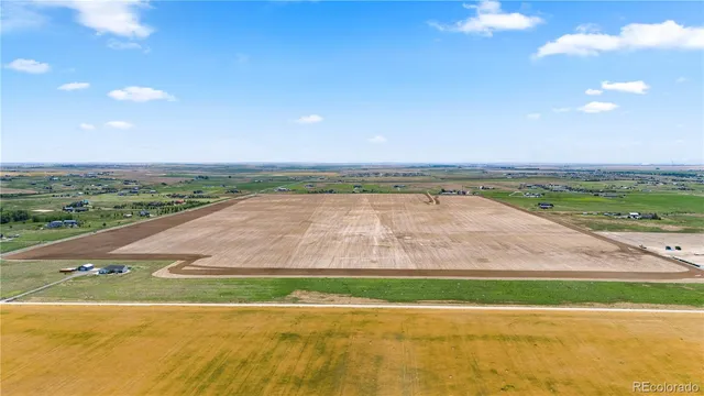 a view of an ocean and a mountain