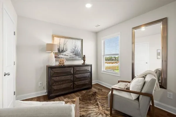 a room with furniture and window