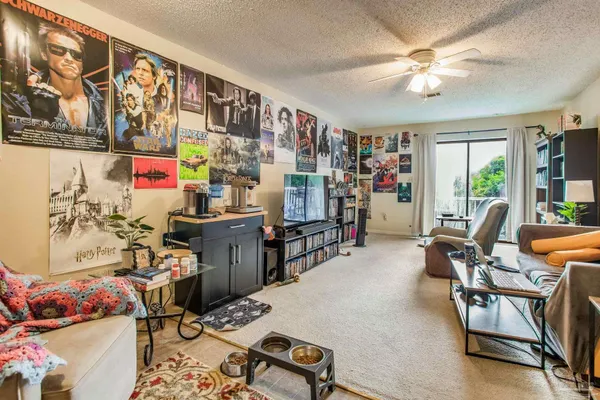 a view of a workspace with furniture and a livingroom
