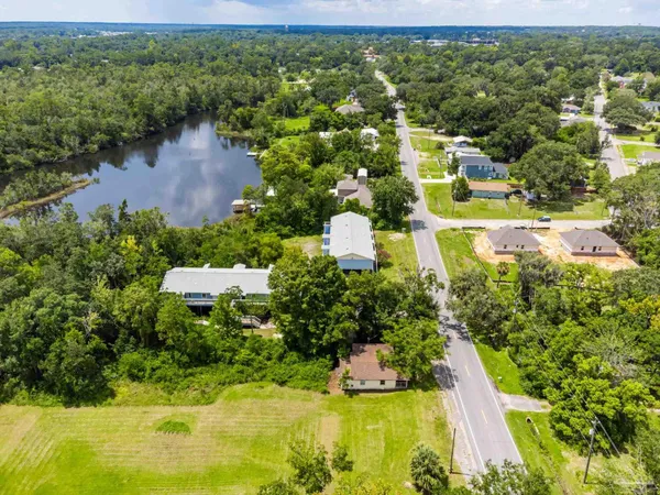 a view of a lake with a building in the background
