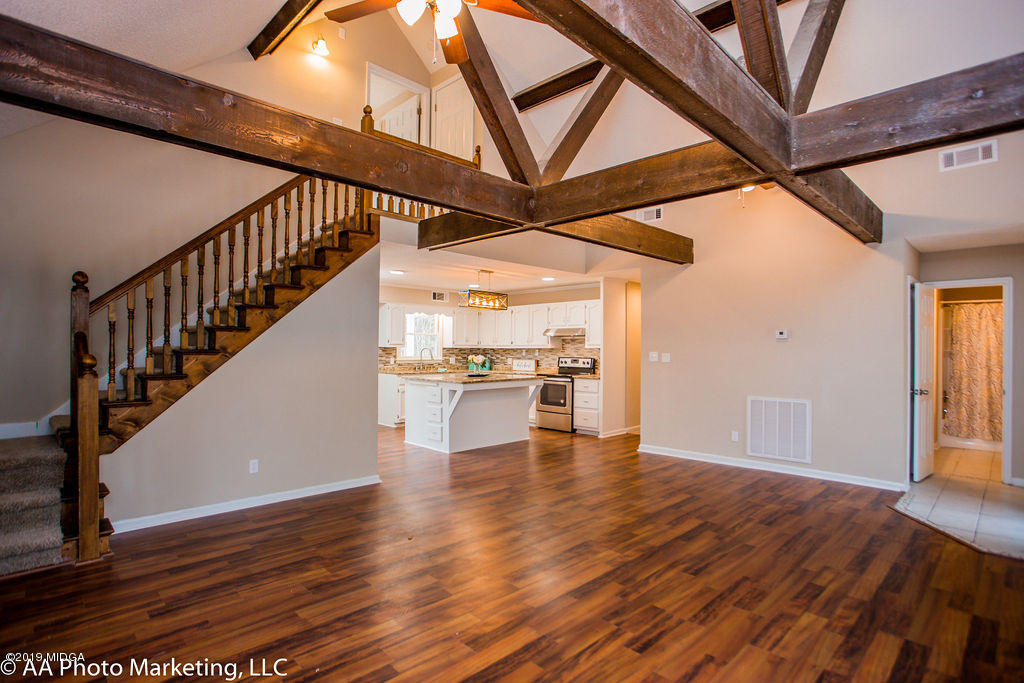 922 Woolfolk Road Fort Valley, GA 31030 - Photo 15 of 38 a view of entryway and hall with wooden floor