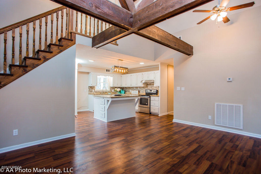 922 Woolfolk Road Fort Valley, GA 31030 - Photo 19 of 38 a view of kitchen with furniture and wooden floor