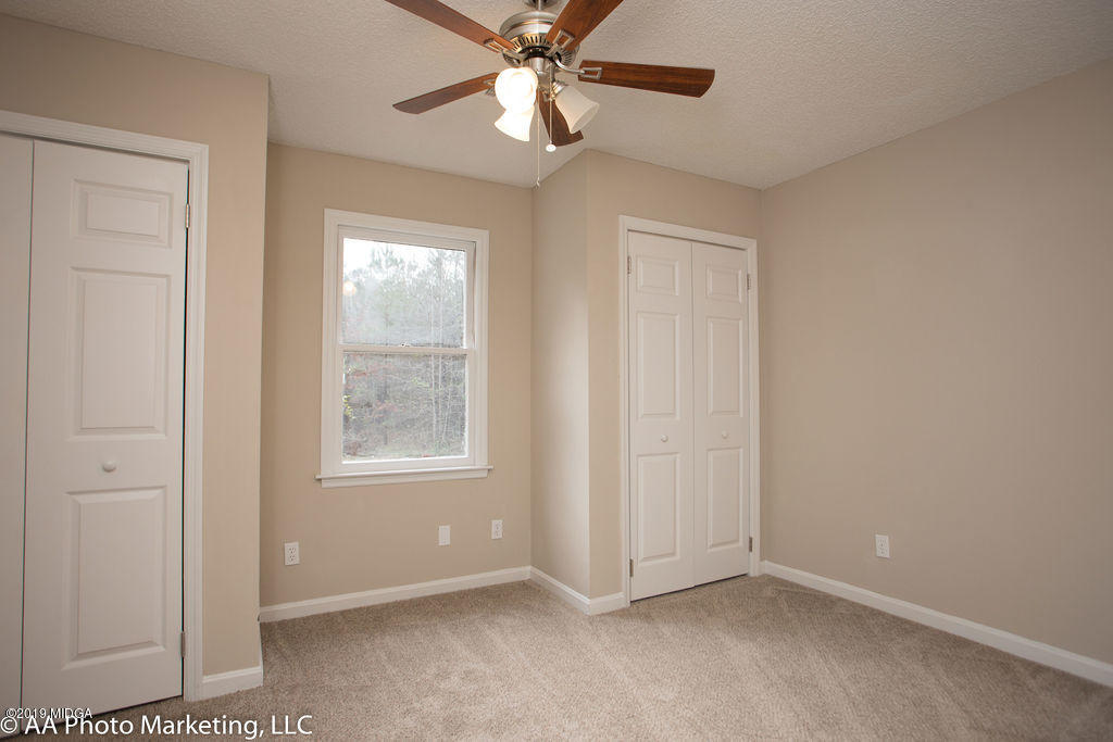 922 Woolfolk Road Fort Valley, GA 31030 - Photo 23 of 38 a view of an empty room with a window