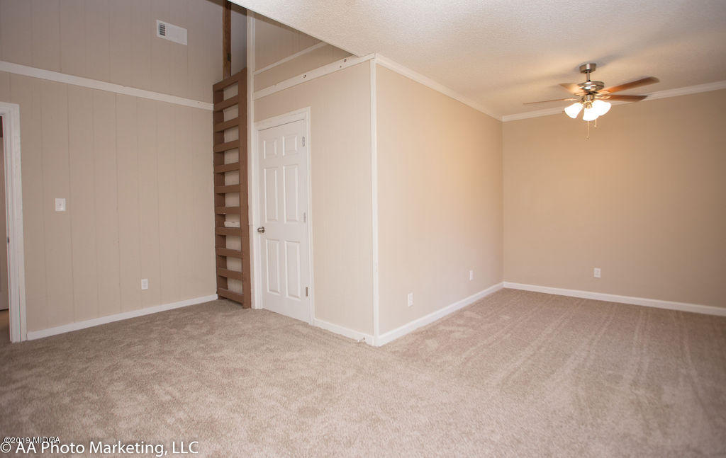 922 Woolfolk Road Fort Valley, GA 31030 - Photo 32 of 38 a view of an empty room with a window