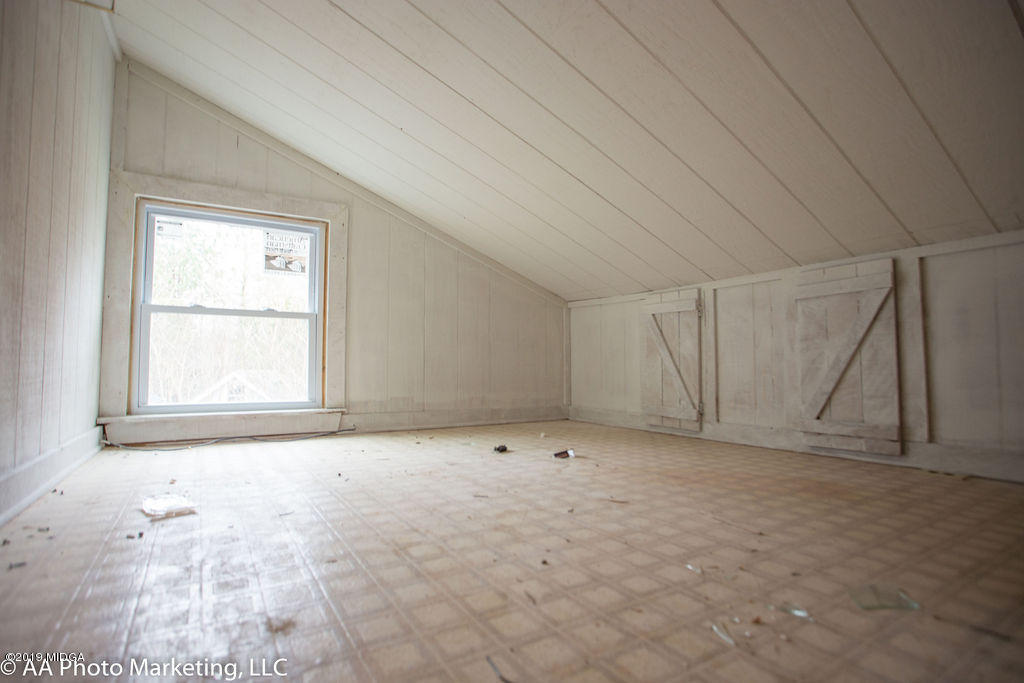 922 Woolfolk Road Fort Valley, GA 31030 - Photo 33 of 38 a view of an empty room with a window