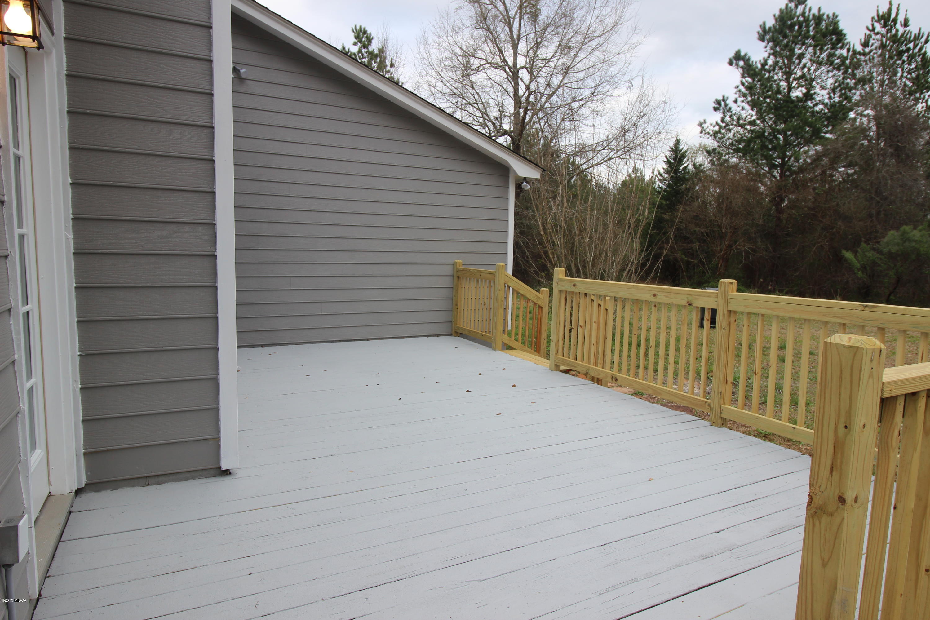922 Woolfolk Road Fort Valley, GA 31030 - Photo 35 of 38 a view of a wooden fence