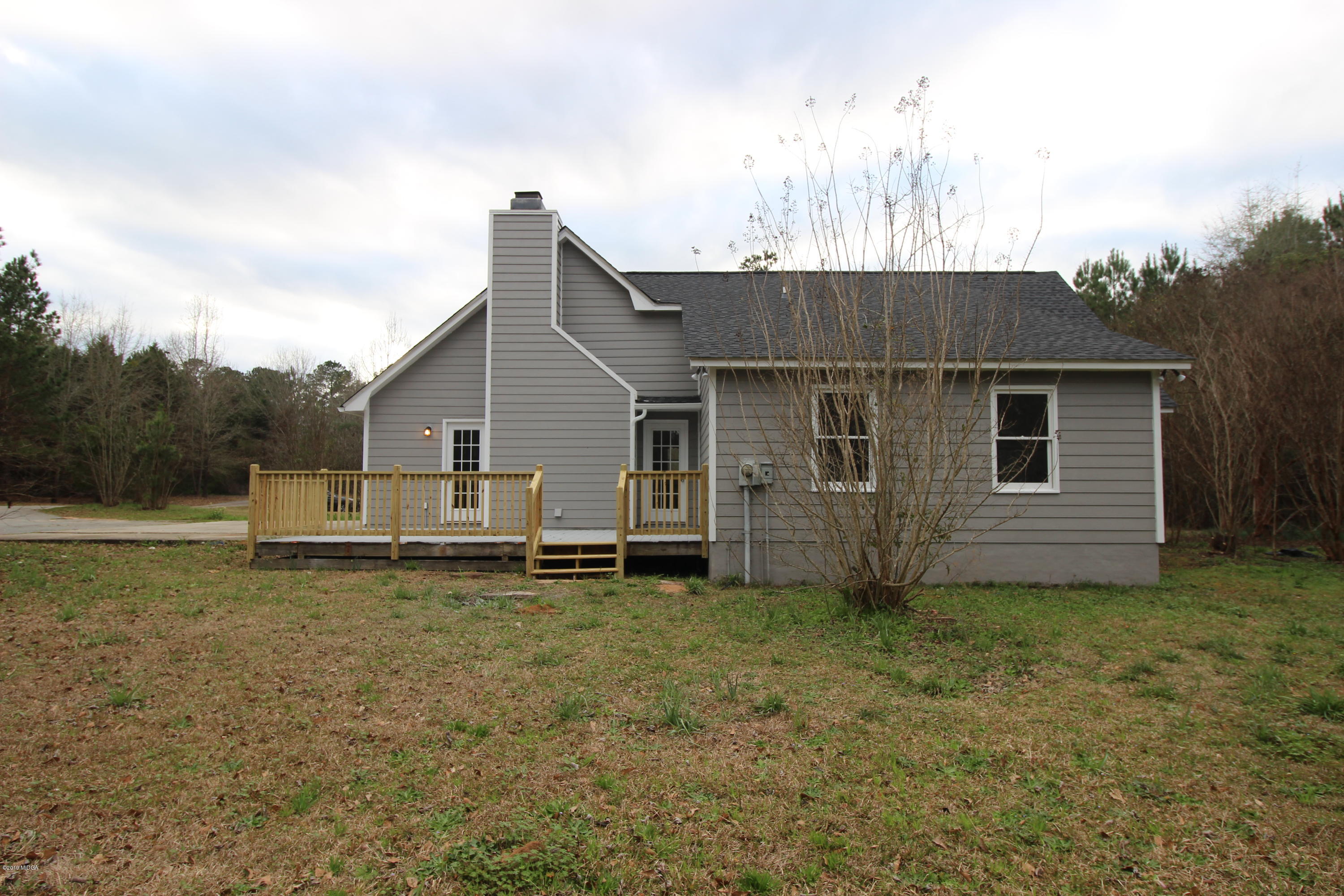 922 Woolfolk Road Fort Valley, GA 31030 - Photo 36 of 38 a backyard of a house