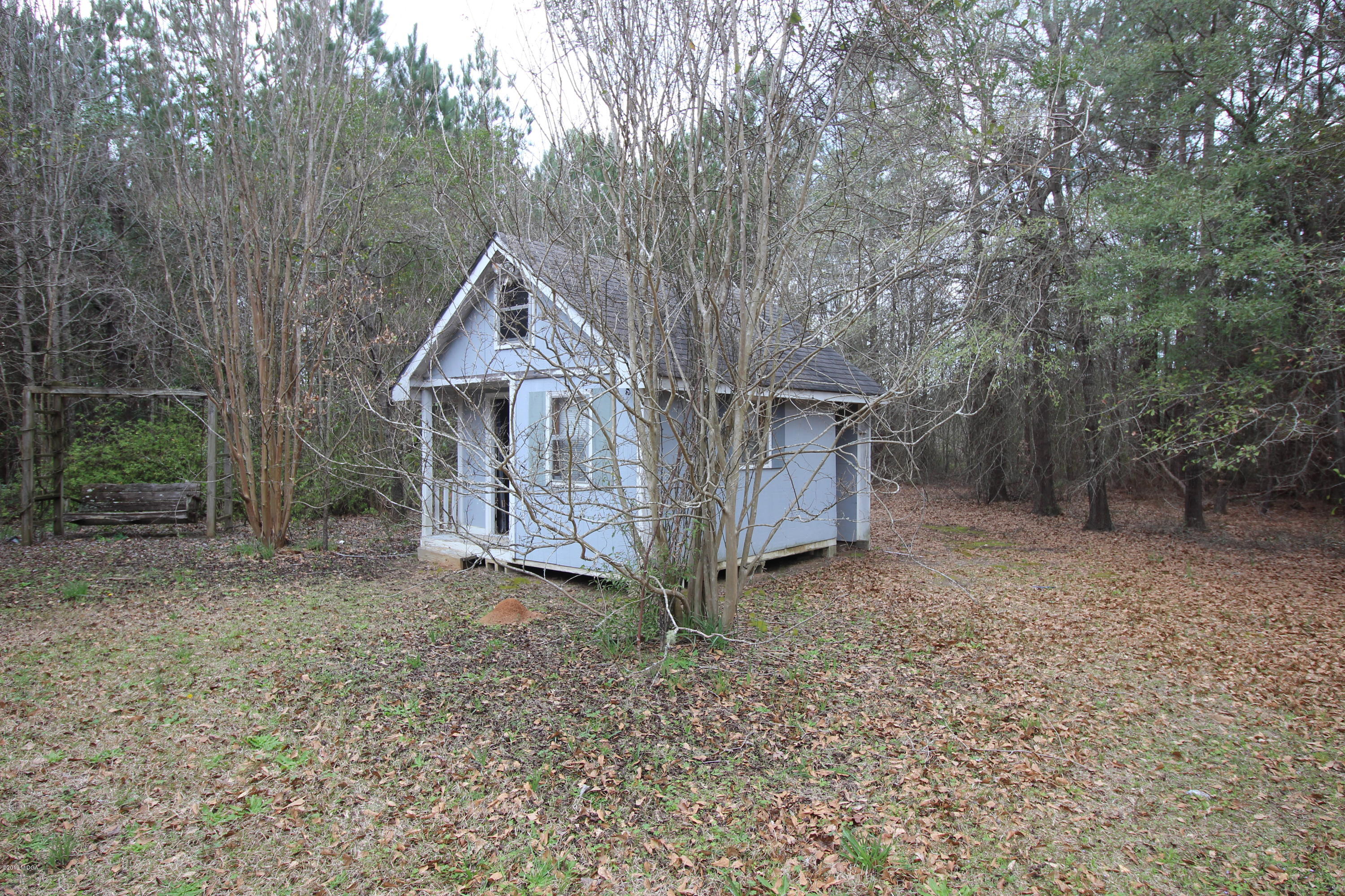 922 Woolfolk Road Fort Valley, GA 31030 - Photo 38 of 38 a house with a yard