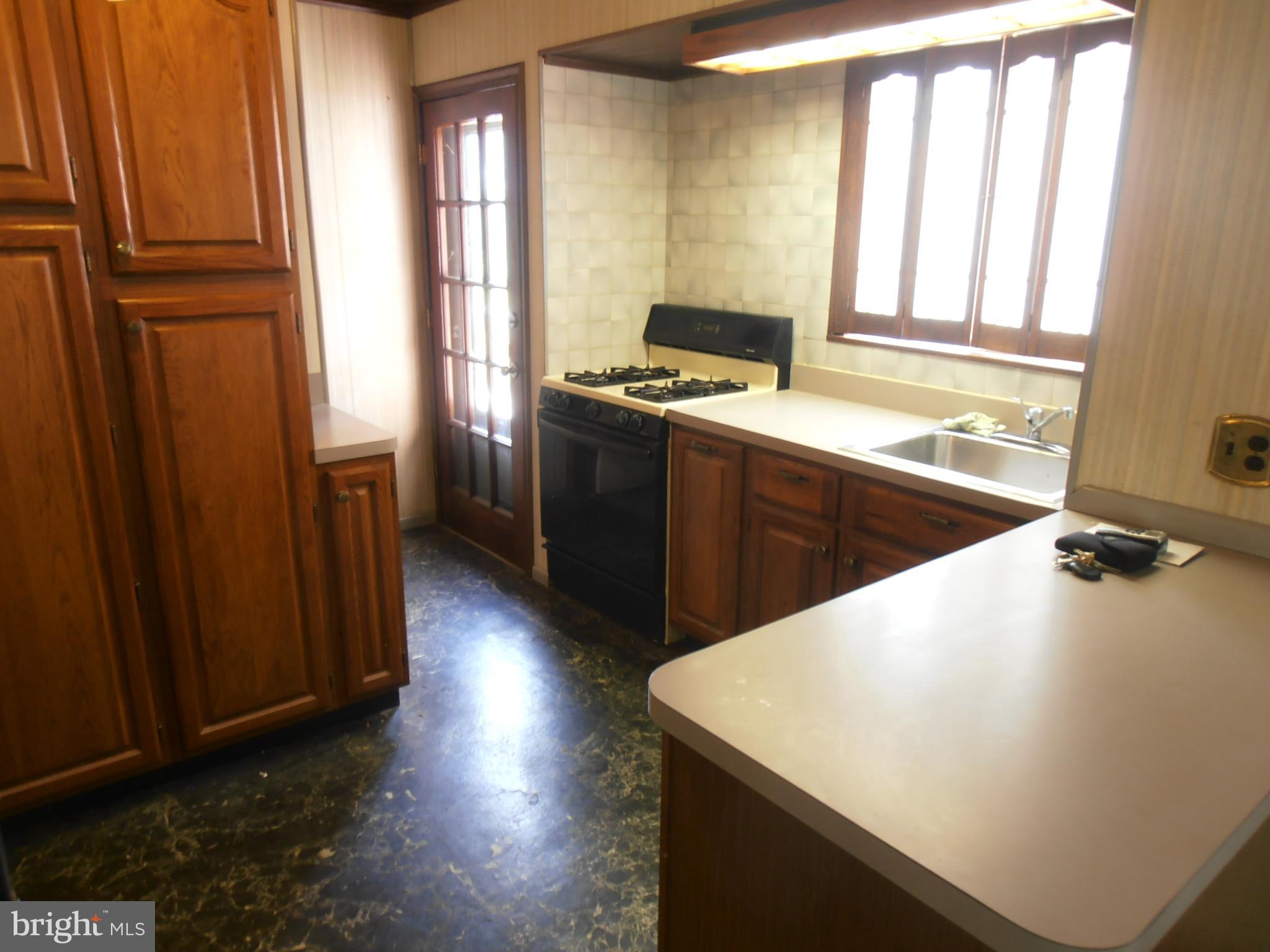 136 Hickstown Road Sicklerville, NJ 08081 - Photo 23 of 34 "L" shaped Kitchen with cherry cabinets,