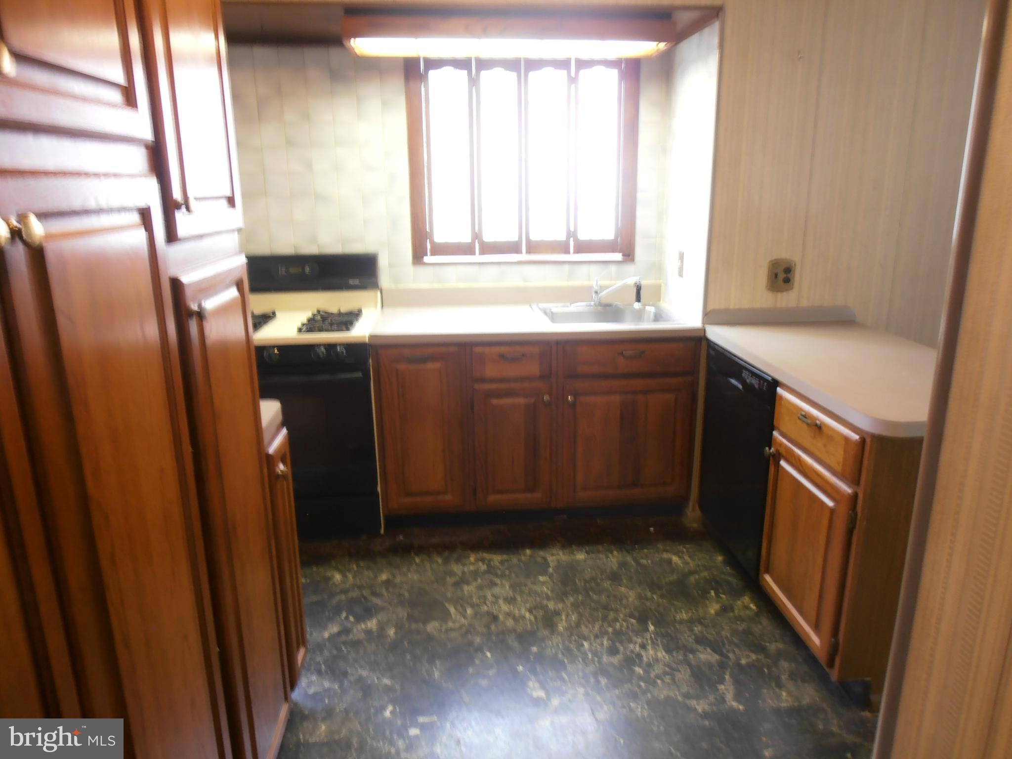 136 Hickstown Road Sicklerville, NJ 08081 - Photo 25 of 34 kitchen floor has hardwood under the vinyl
