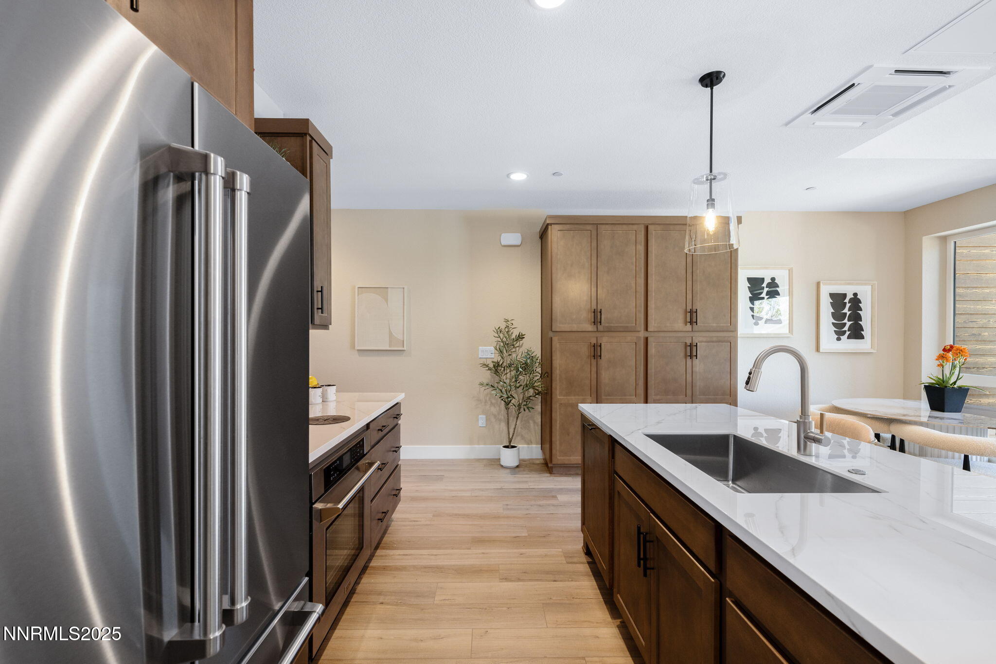 3834 Lakeside Drive, Unit 18 Reno, NV 89509 - Photo 10 of 20 15-Plan C or D Kitchen & Pantry -18 on L