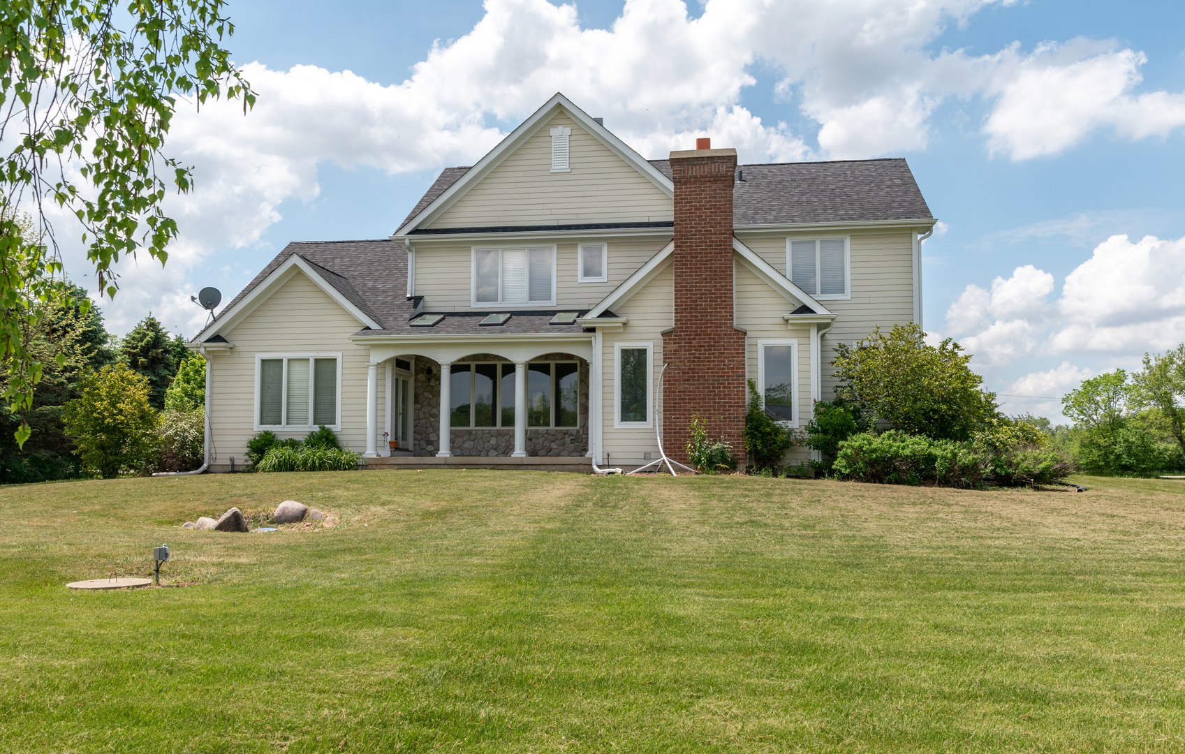1500 Cherry Valley Road Bull Valley, IL 60050 - Photo 3 of 30 a front view of a house with a yard