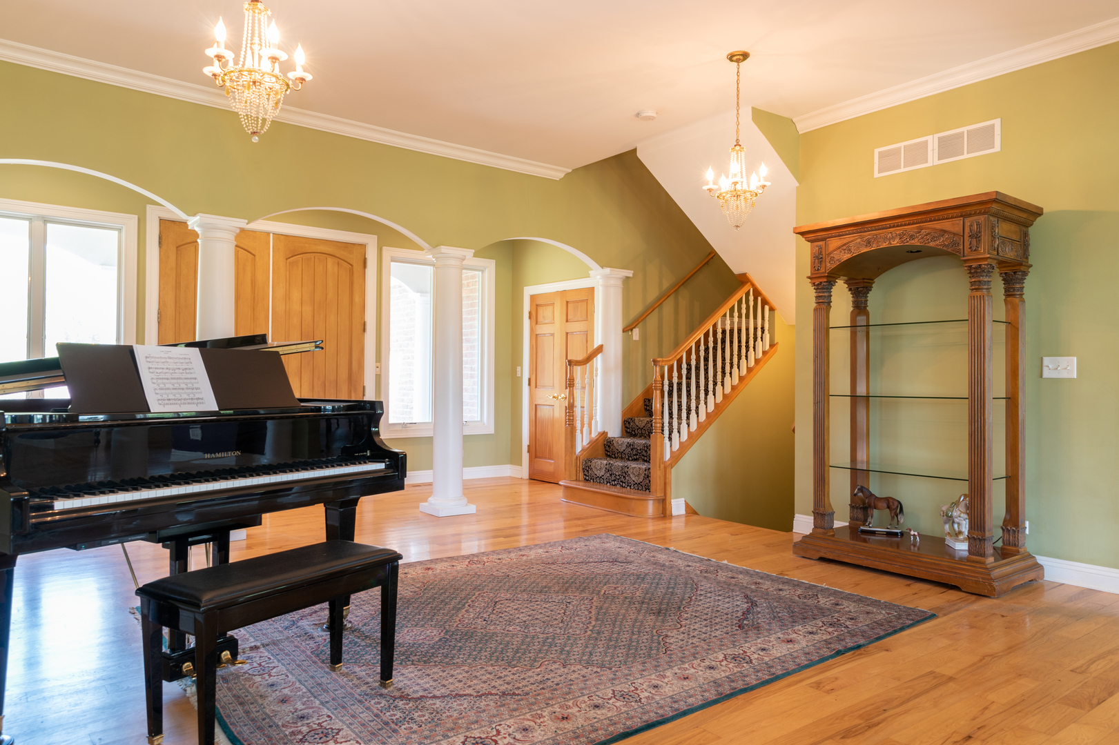 1500 Cherry Valley Road Bull Valley, IL 60050 - Photo 8 of 30 a view of a livingroom with furniture and a piano