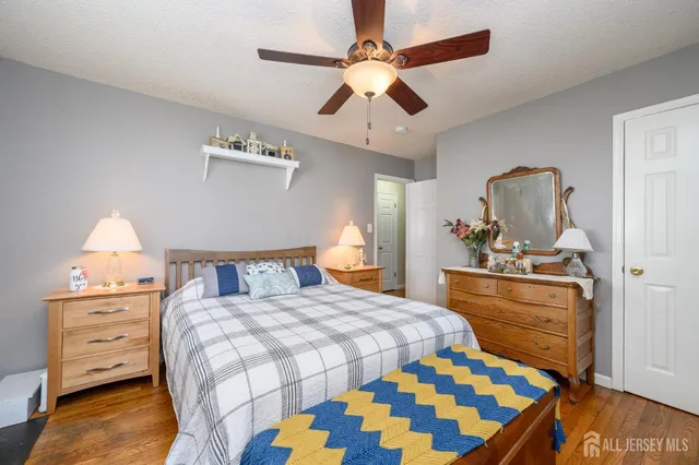 a bedroom with a bed and furniture