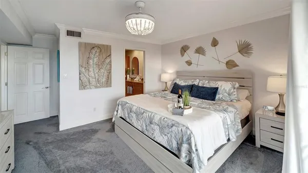 a bedroom with bed and a window