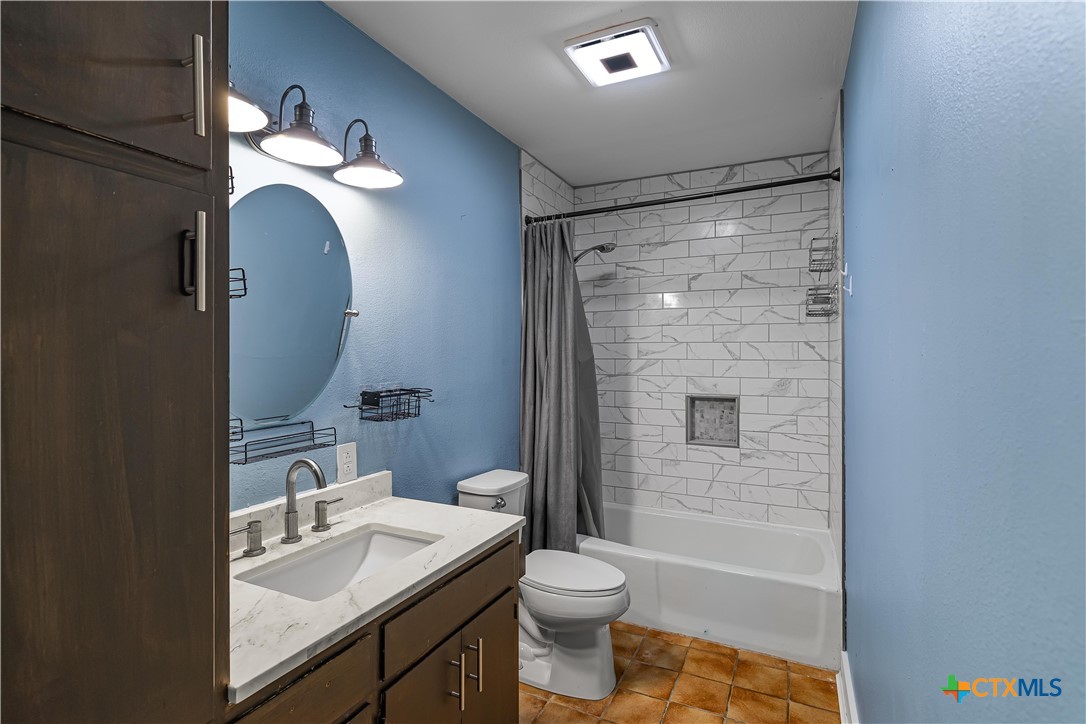 20 Hambleton Road Victoria, TX 77905 - Photo 14 of 48 a bathroom with a sink a toilet and shower