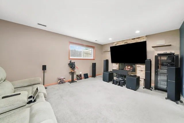 a room with a bed and a flat screen tv