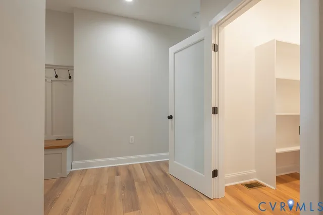 a bathroom with a sink and vanity